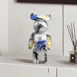 Estatueta Graffiti BearBri da Minimalist House Shop, escultura decorativa com design urbano e detalhes coloridos.