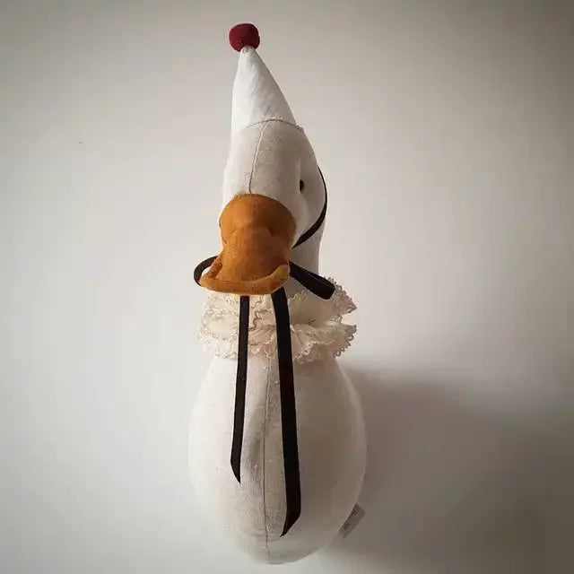 Decoração infantil de parede com pato em estilo minimalista, ideal para quartos de crianças, da marca Minimalist House Shop.